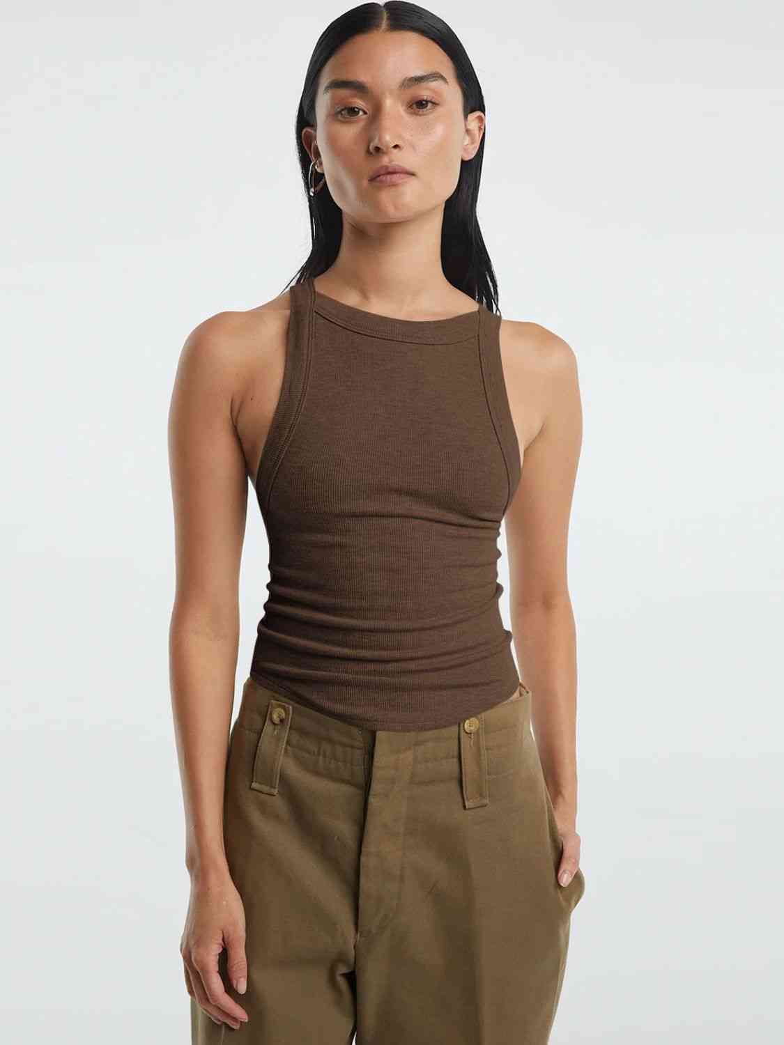 A stylish Halter Neck Ribbed Cropped Top in solid color, showcasing its backless design and sleeveless style, perfect for casual summer wear.