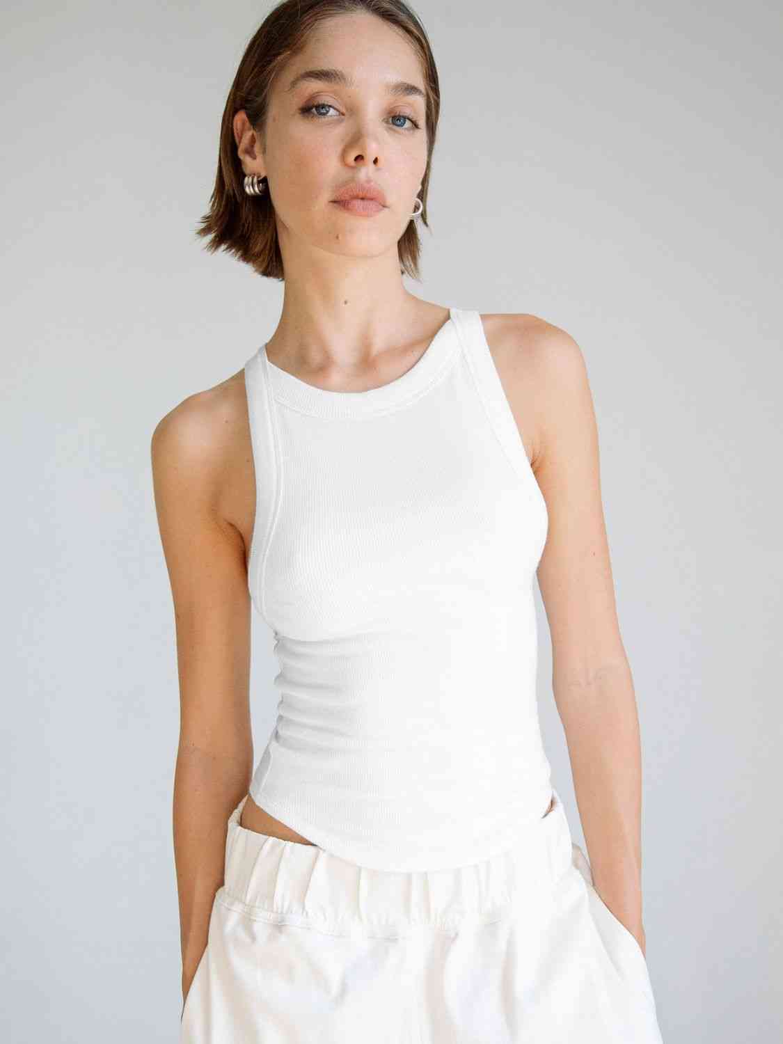 A stylish Halter Neck Ribbed Cropped Top in solid color, showcasing its backless design and sleeveless style, perfect for casual summer wear.