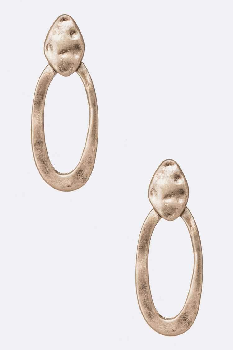 A pair of elegant hammered textured earrings with a 2.2-inch drop, showcasing a unique design perfect for any occasion.