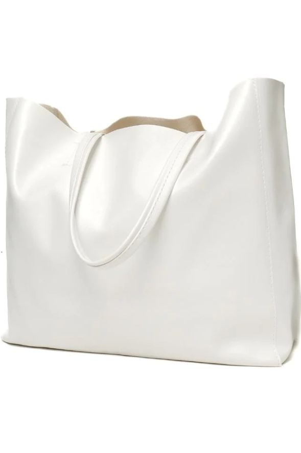 Elegant white handbag made of high-quality faux leather, featuring a sleek design and durable material.