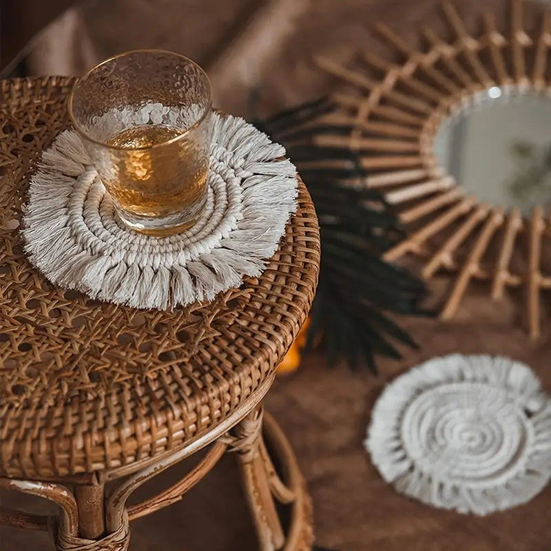 Hand braided cotton rope coaster with a rustic bohemian design, perfect for dining tables.