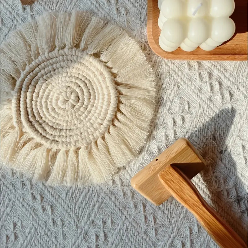 Hand braided cotton rope coaster with a rustic bohemian design, perfect for dining tables.