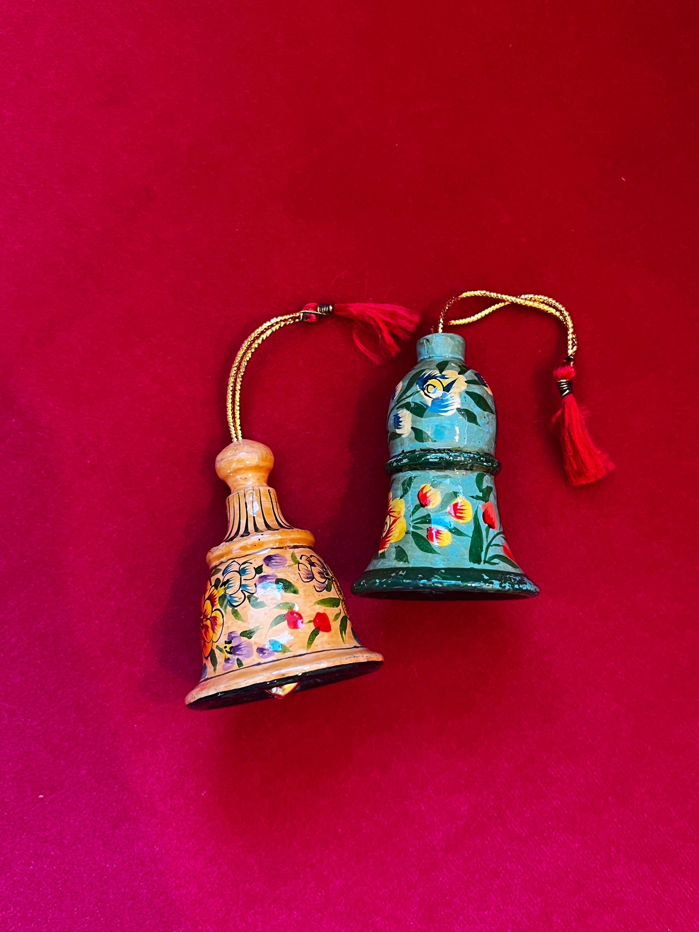 Hand Painted Bell Ornament in assorted colors, showcasing intricate designs by Indian artisans.