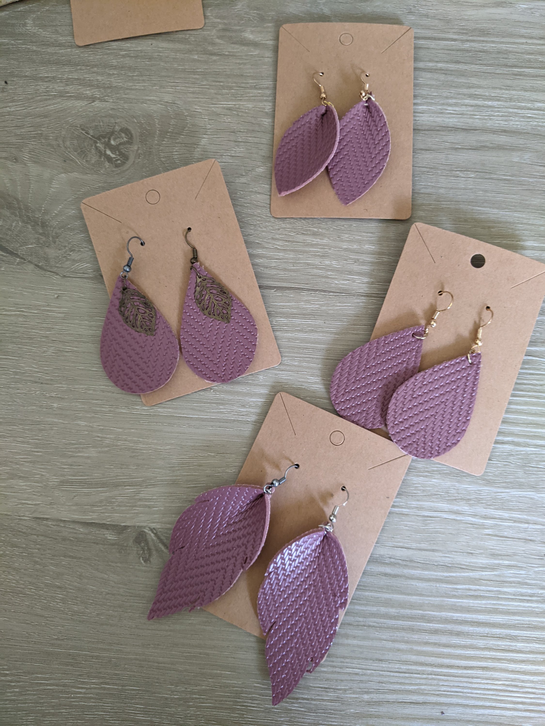 Handmade mauve chevron faux leather earrings, lightweight and stylish, perfect for any occasion.