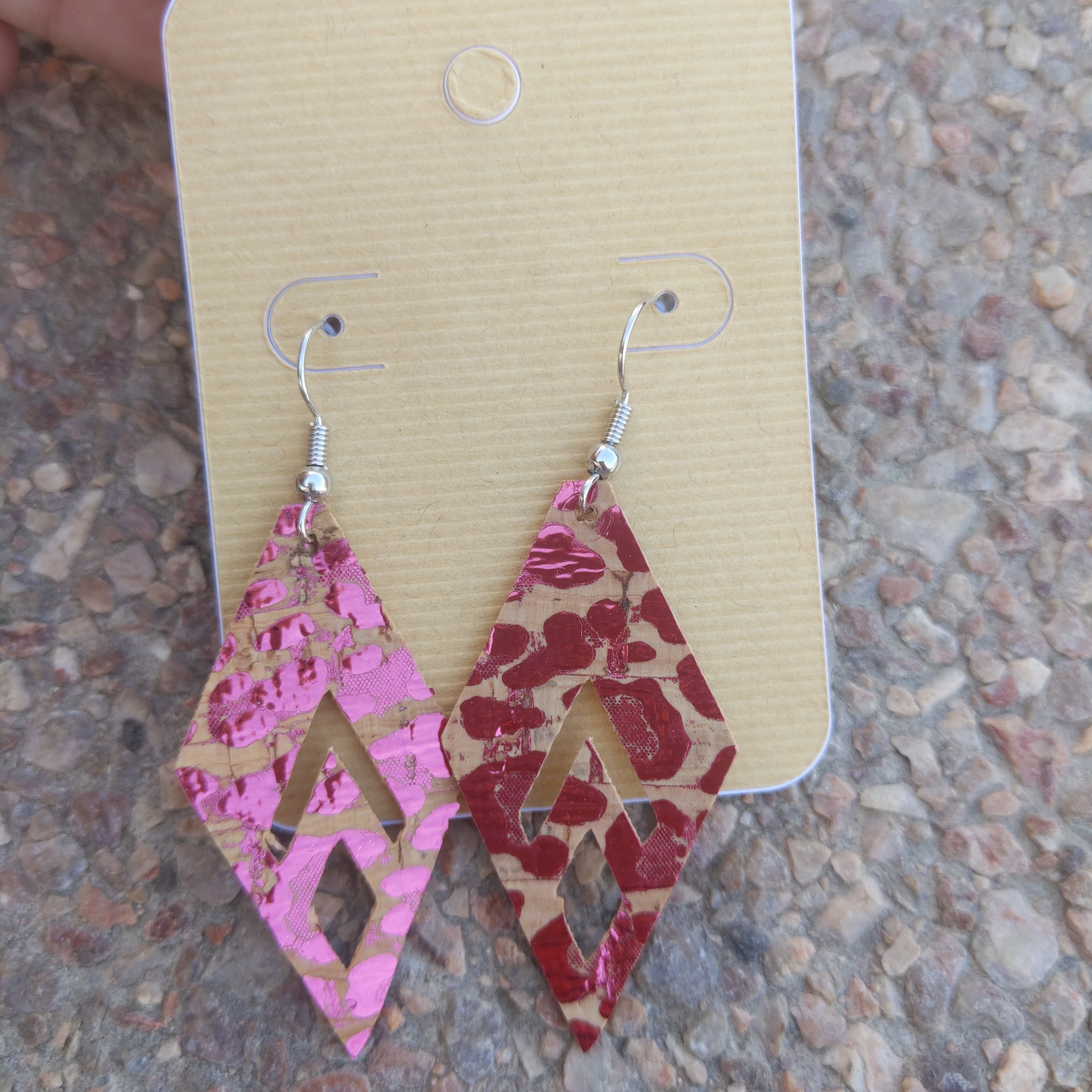 A pair of handmade metallic cheetah faux leather earrings, featuring a trendy animal print design, lightweight and stylish.