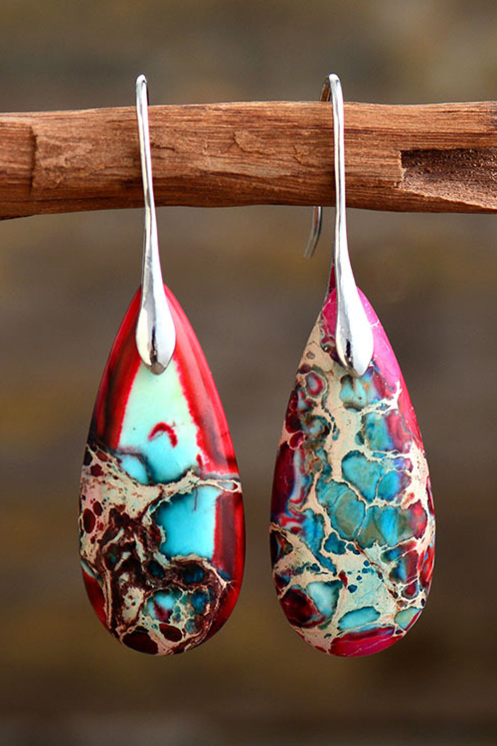 Handmade teardrop shape dangle earrings featuring natural stones, copper, and gold plating, showcasing unique patterns and modern design.