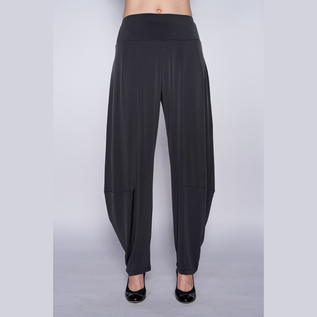 A pair of stylish Harem Pants featuring a wide elastic waistband, made from a soft polyester-spandex blend, perfect for casual wear.