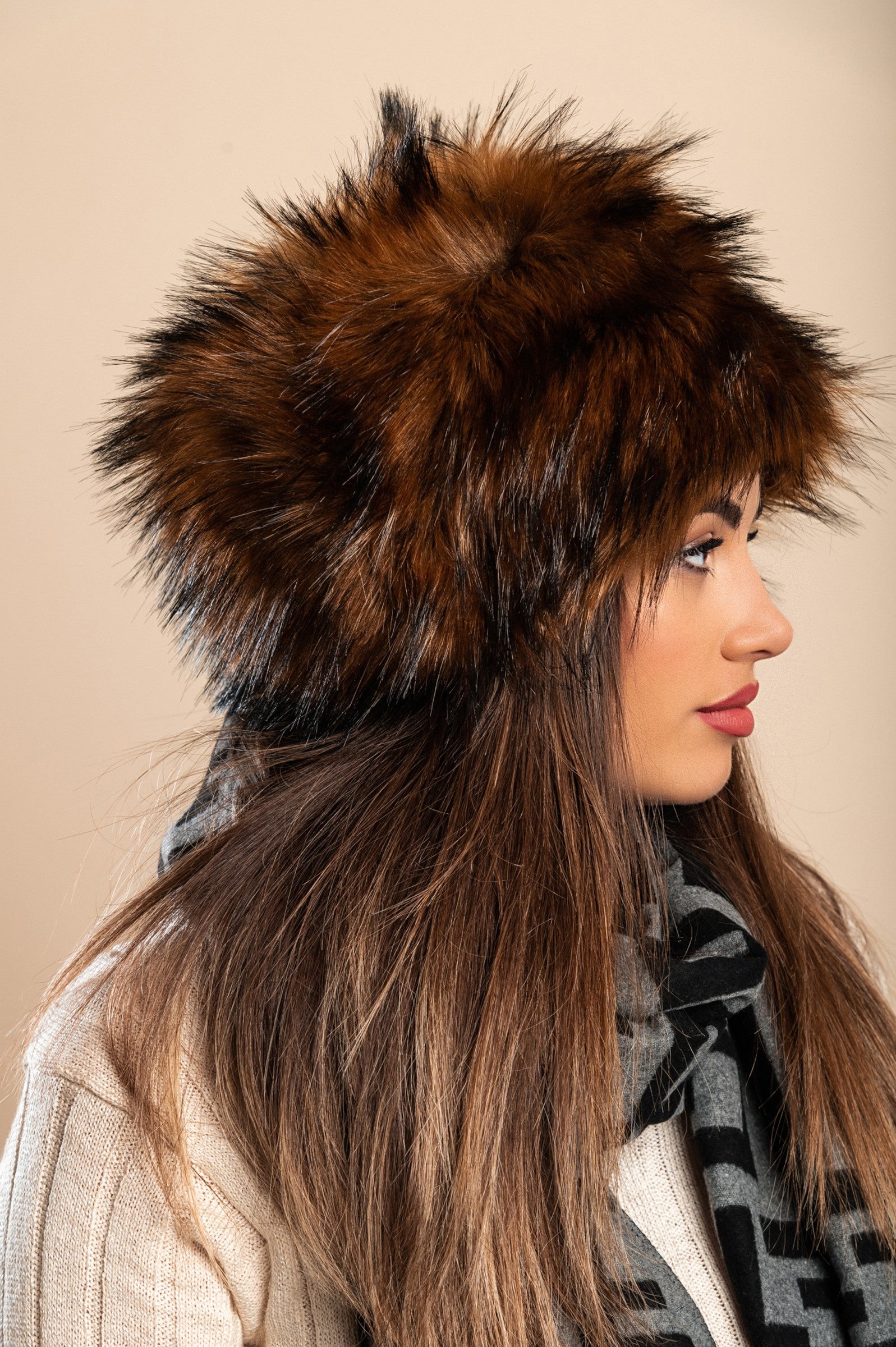 Elegant dark brown hat with soft synthetic fur, perfect for winter fashion.