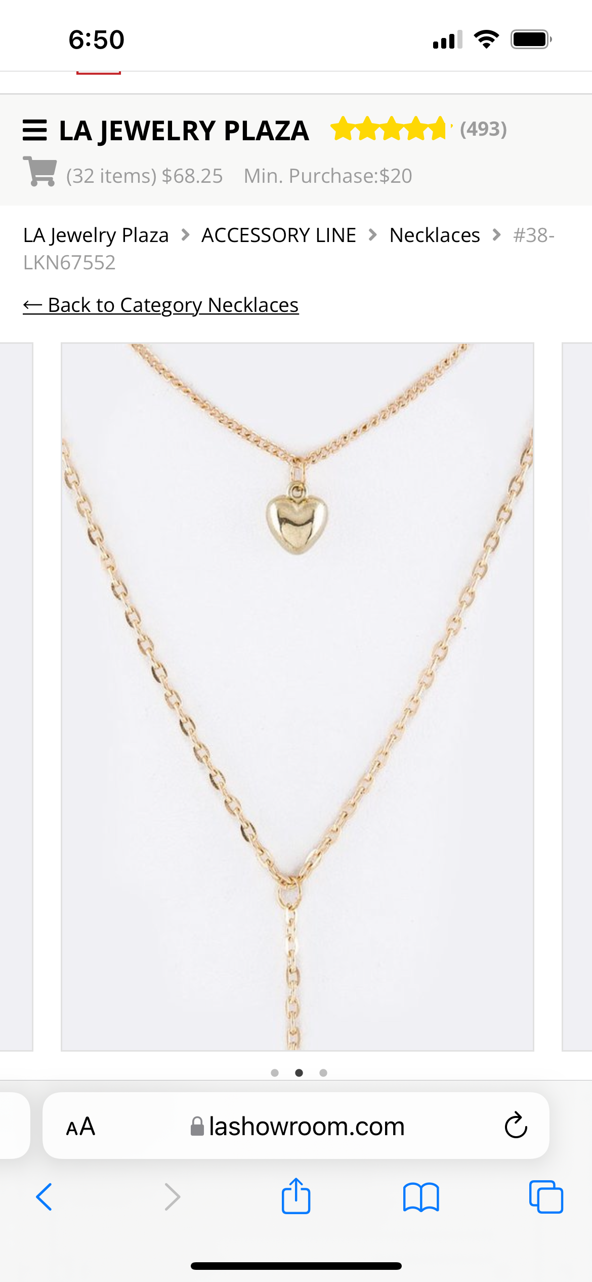 A stylish heart double layer necklace featuring a long chain and a shorter chain with a heart pendant, perfect for enhancing any outfit.