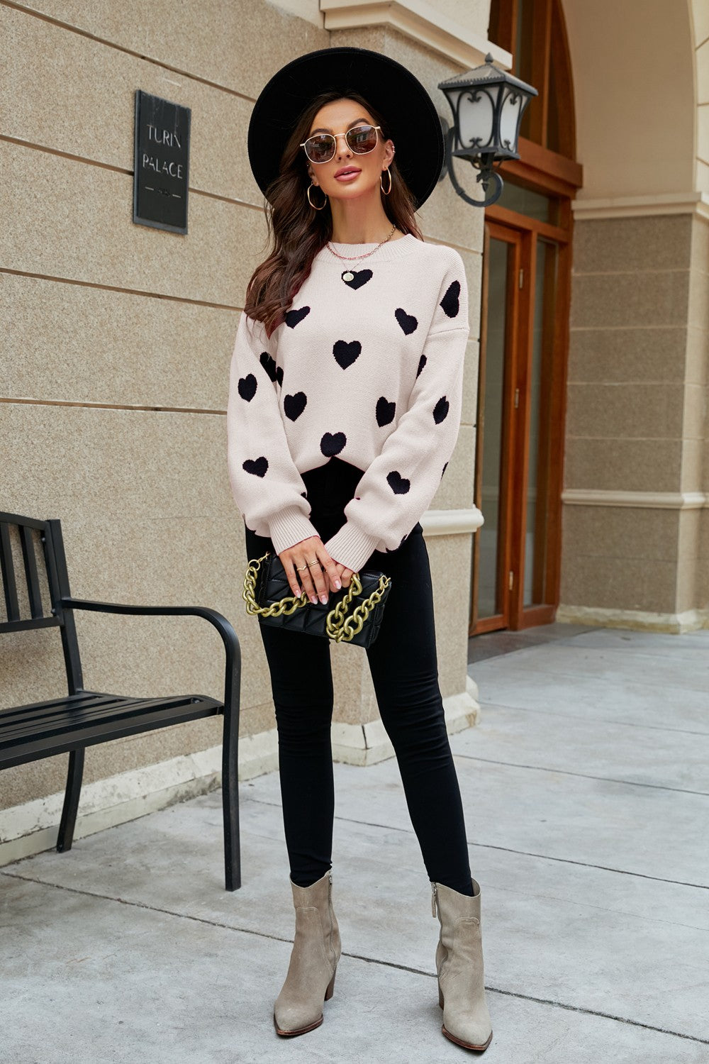 Heart Pattern Lantern Sleeve Round Neck Tunic Sweater in a casual outdoor setting, showcasing its stylish design and comfortable fit.