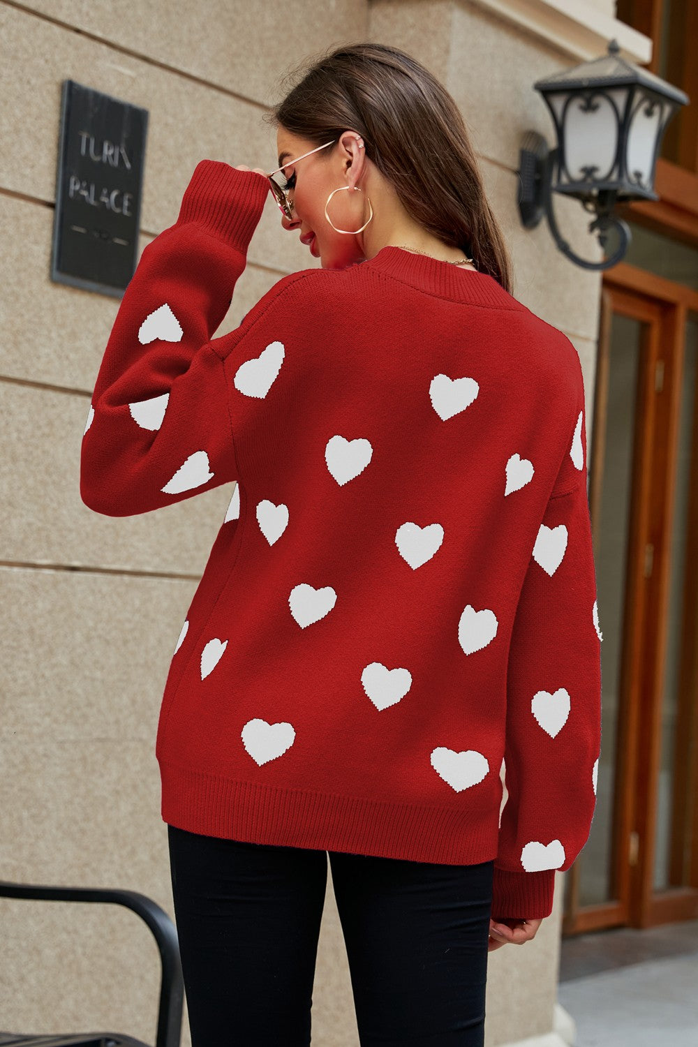 Heart Pattern Lantern Sleeve Round Neck Tunic Sweater in a casual outdoor setting, showcasing its stylish design and comfortable fit.