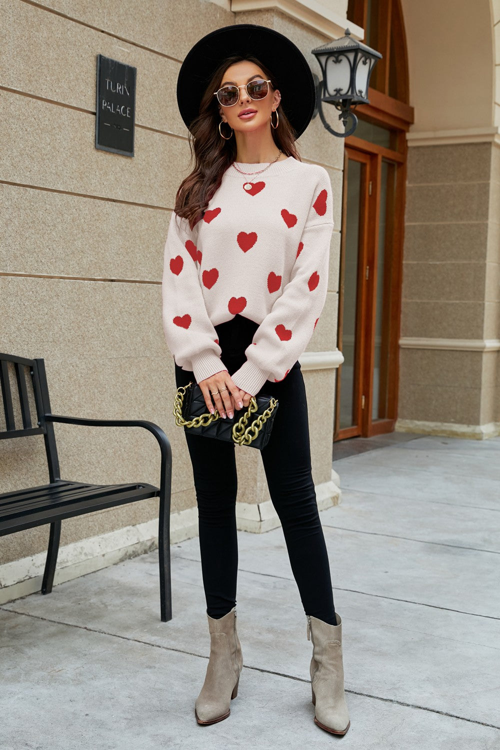 Heart Pattern Lantern Sleeve Round Neck Tunic Sweater in a casual outdoor setting, showcasing its stylish design and comfortable fit.