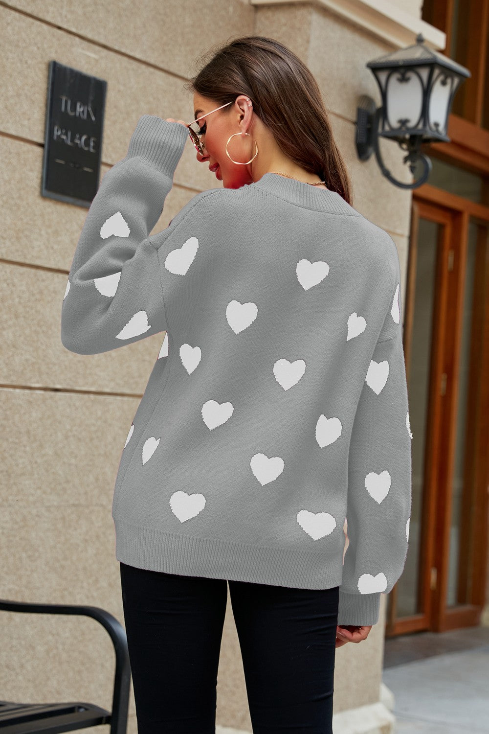 Heart Pattern Lantern Sleeve Round Neck Tunic Sweater in a casual outdoor setting, showcasing its stylish design and comfortable fit.