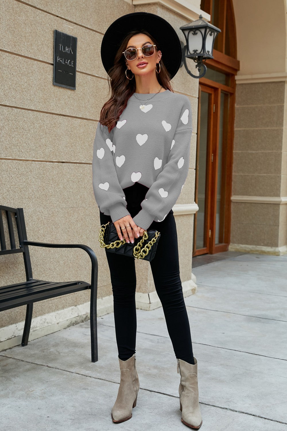 Heart Pattern Lantern Sleeve Round Neck Tunic Sweater in a casual outdoor setting, showcasing its stylish design and comfortable fit.