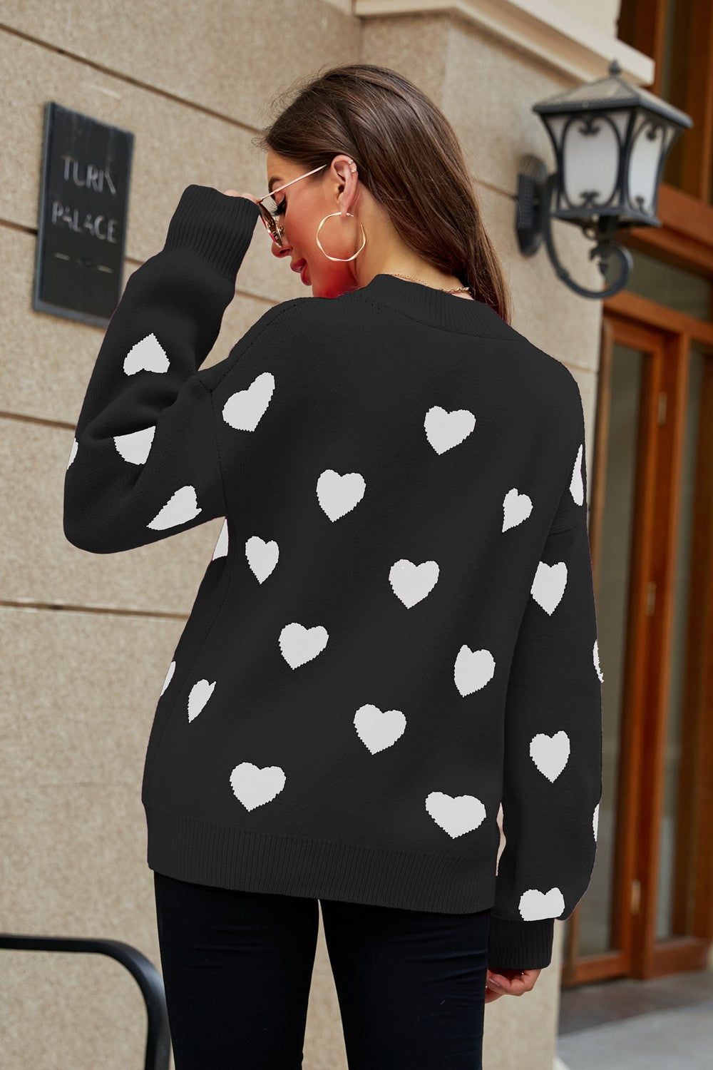 Heart Pattern Lantern Sleeve Round Neck Tunic Sweater in a casual outdoor setting, showcasing its stylish design and comfortable fit.