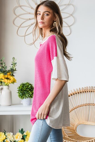 Heimish Full Size Contrast Waffle-Knit Half Sleeve Blouse showcasing its unique waffle-knit texture and stylish design.