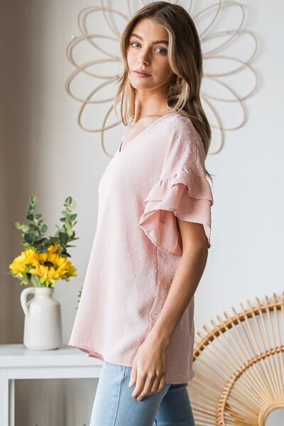 Heimish Full Size Swiss Dot Ruffle Short Sleeve Top featuring a charming swiss dot pattern and delicate ruffle sleeves, perfect for casual or dressy occasions.