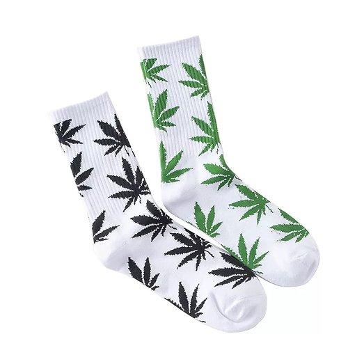 A pair of soft cotton socks featuring a vibrant hemp leaf design, perfect for cannabis enthusiasts.