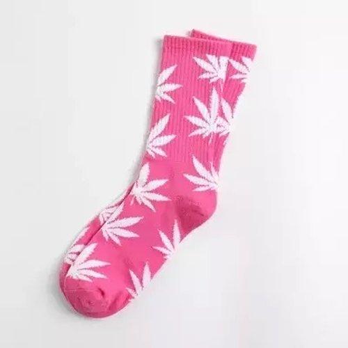 A pair of soft cotton socks featuring a vibrant hemp leaf design, perfect for cannabis enthusiasts.