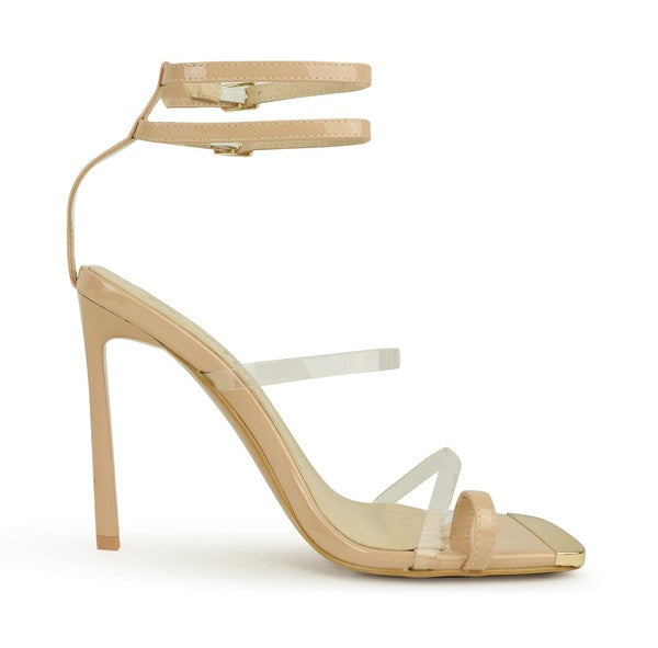 Elegant high heel sandals with ankle straps in various colors, showcasing a stylish design suitable for any occasion.