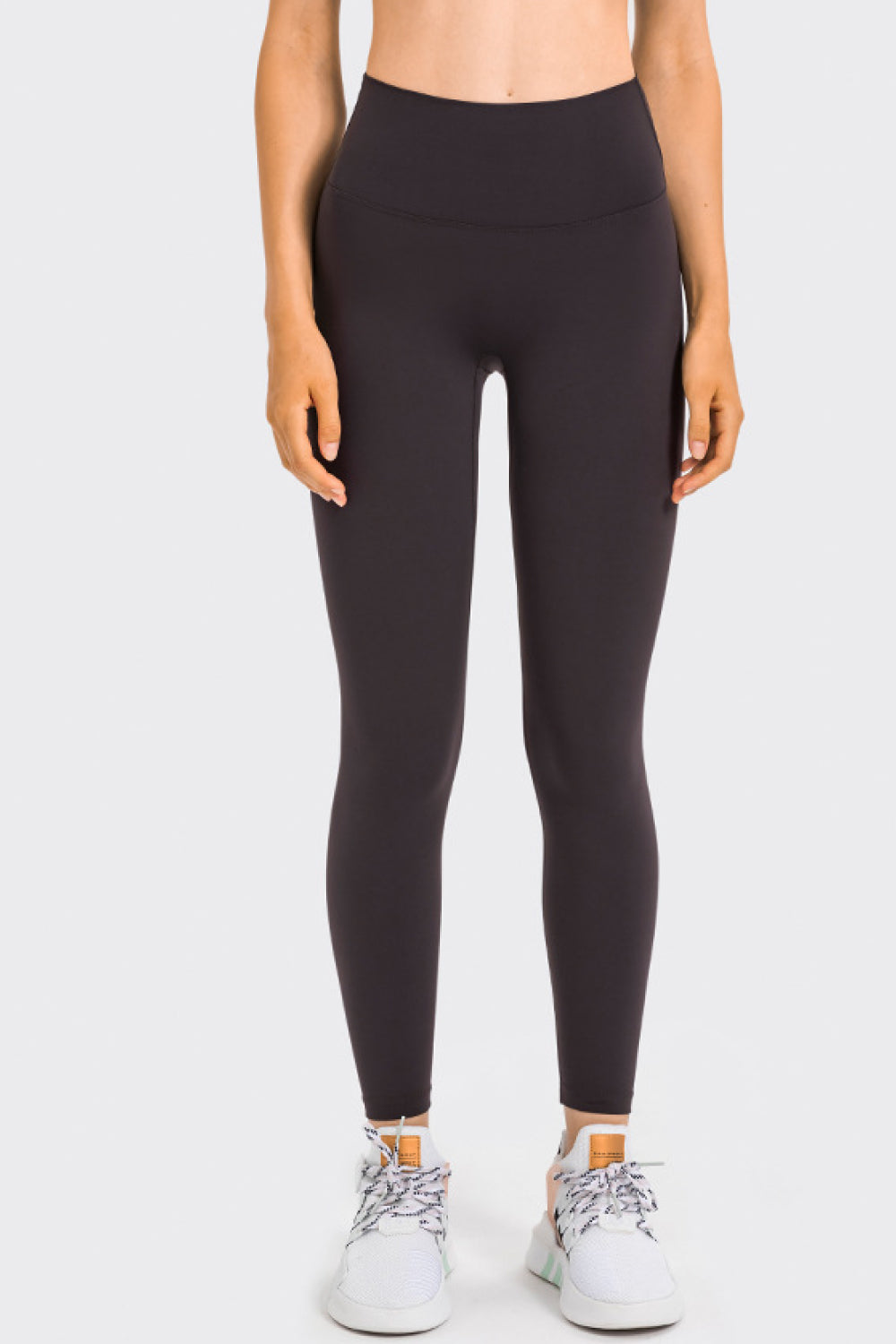 High Rise Crop Fitness Leggings in solid color, showcasing a slim fit and high-rise design, perfect for workouts.