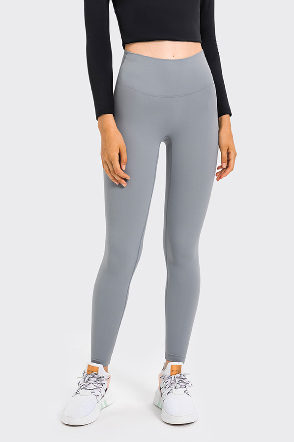 High Rise Crop Fitness Leggings in solid color, showcasing a slim fit and high-rise design, perfect for workouts.