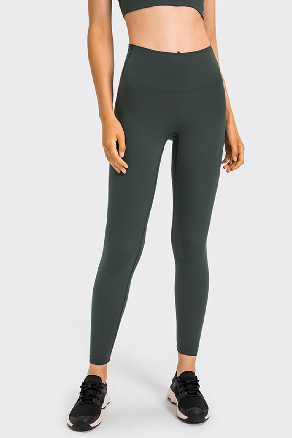 High Rise Crop Fitness Leggings in solid color, showcasing a slim fit and high-rise design, perfect for workouts.