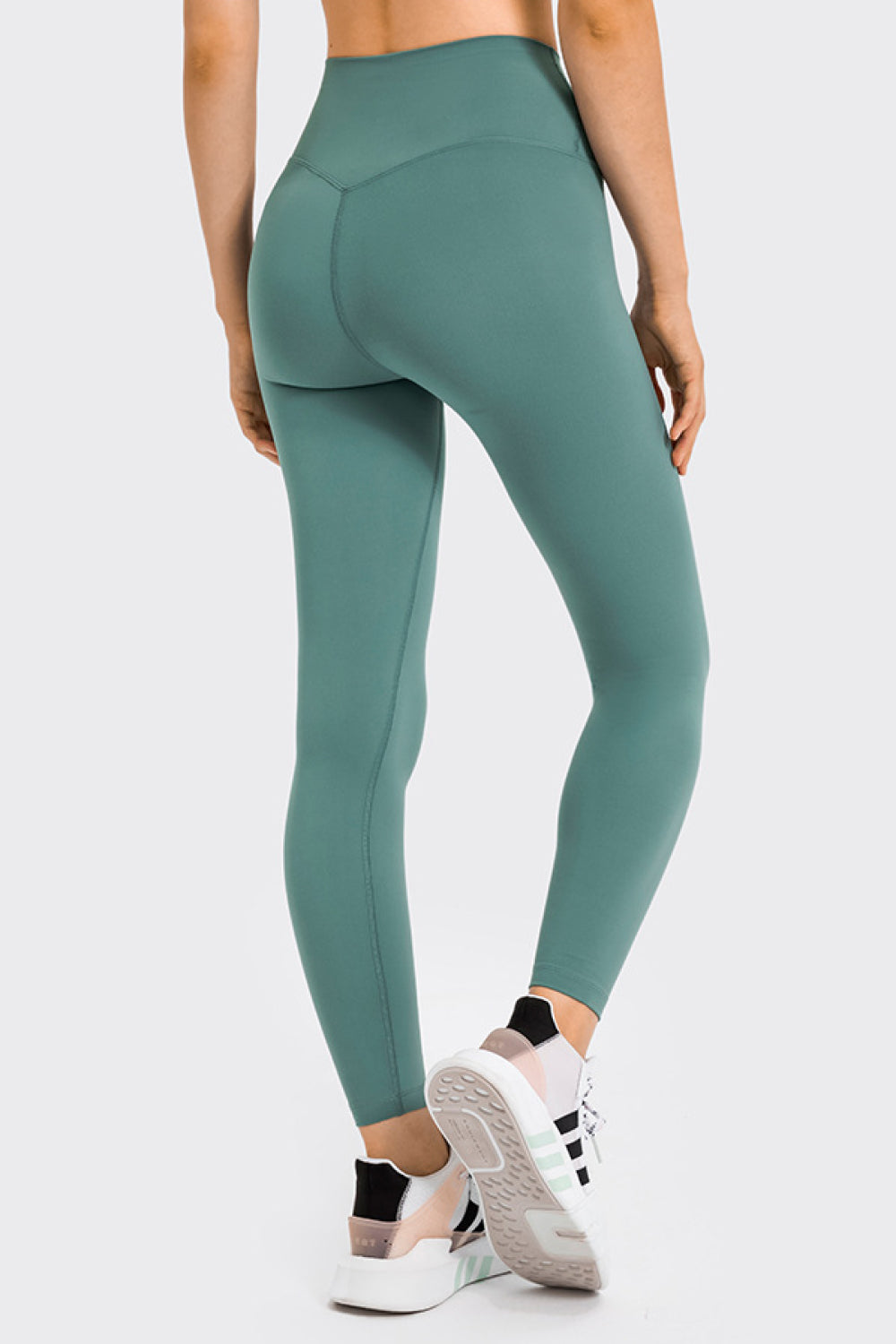 High Rise Crop Fitness Leggings in solid color, showcasing a slim fit and high-rise design, perfect for workouts.