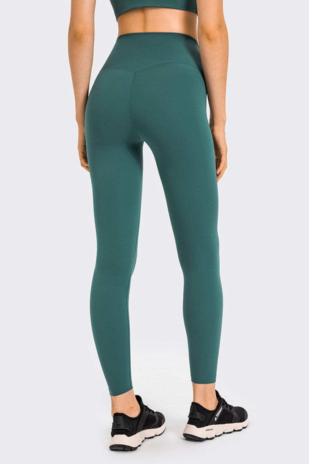 High Rise Crop Fitness Leggings in solid color, showcasing a slim fit and high-rise design, perfect for workouts.