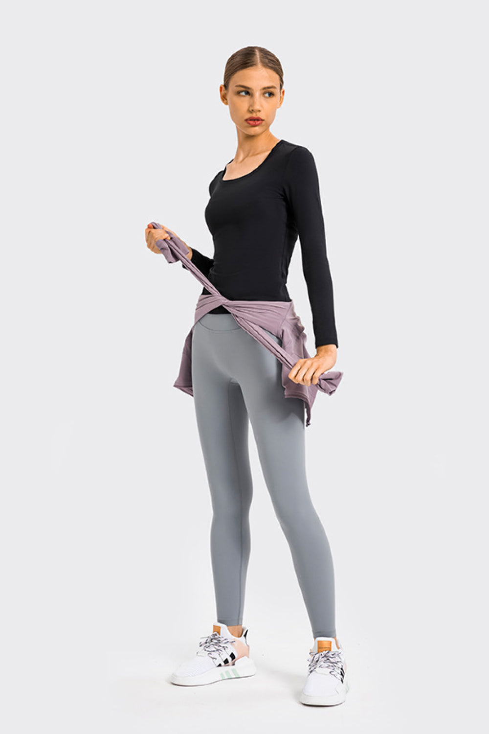 High Rise Crop Fitness Leggings in solid color, showcasing a slim fit and high-rise design, perfect for workouts.