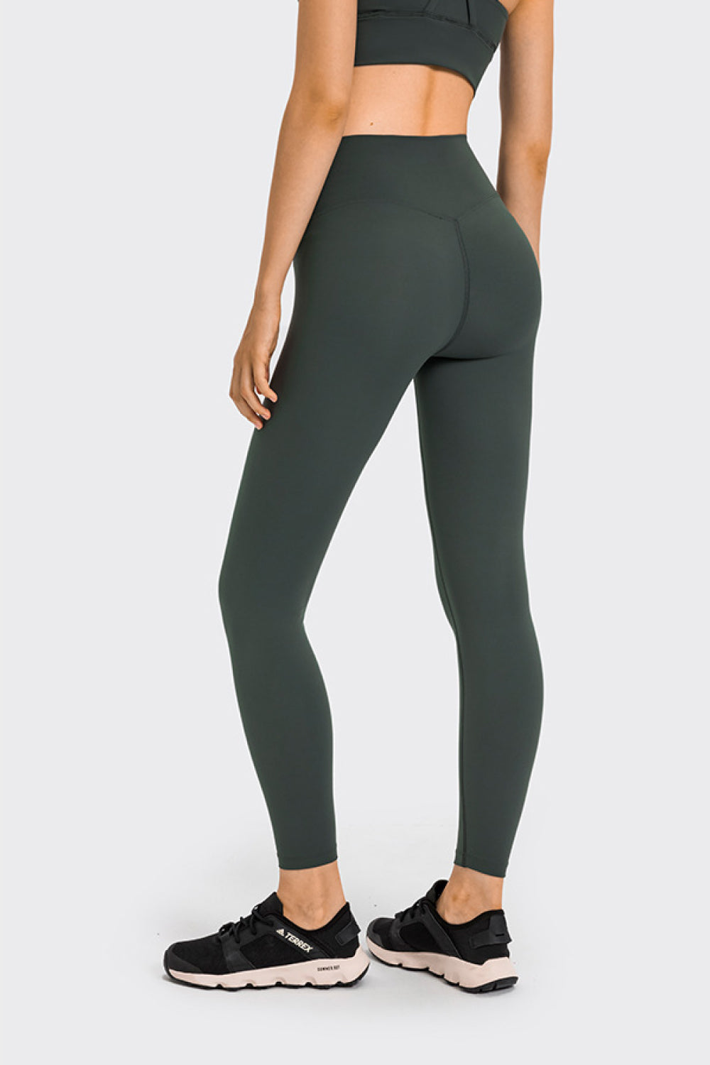 High Rise Crop Fitness Leggings in solid color, showcasing a slim fit and high-rise design, perfect for workouts.