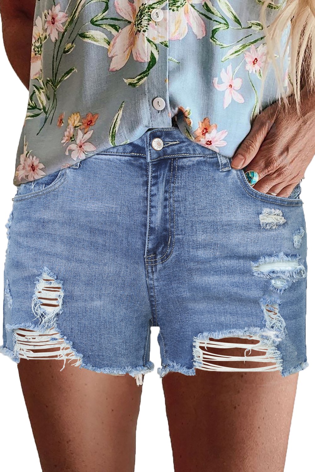 High Rise Destroyed Denim Shorts featuring heavy distressing and a high waist design, perfect for summer fashion.