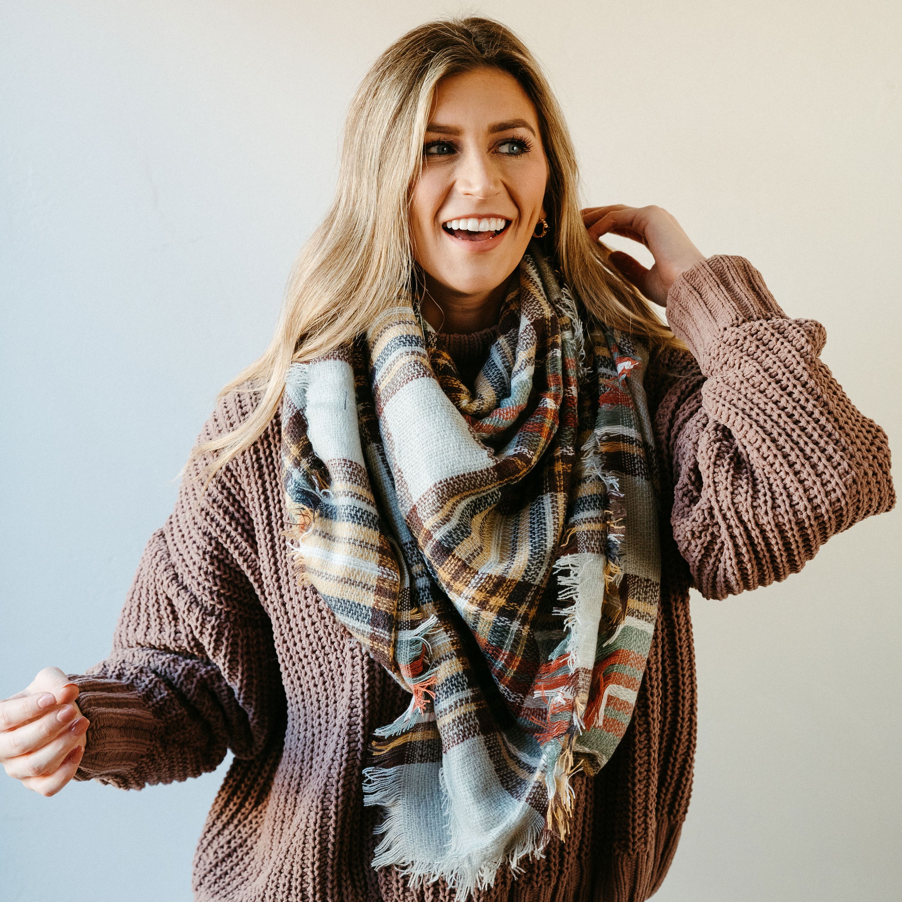 High Street Blanket Scarf in Gray Mustard, showcasing its soft texture and stylish design, perfect for warmth and versatility.