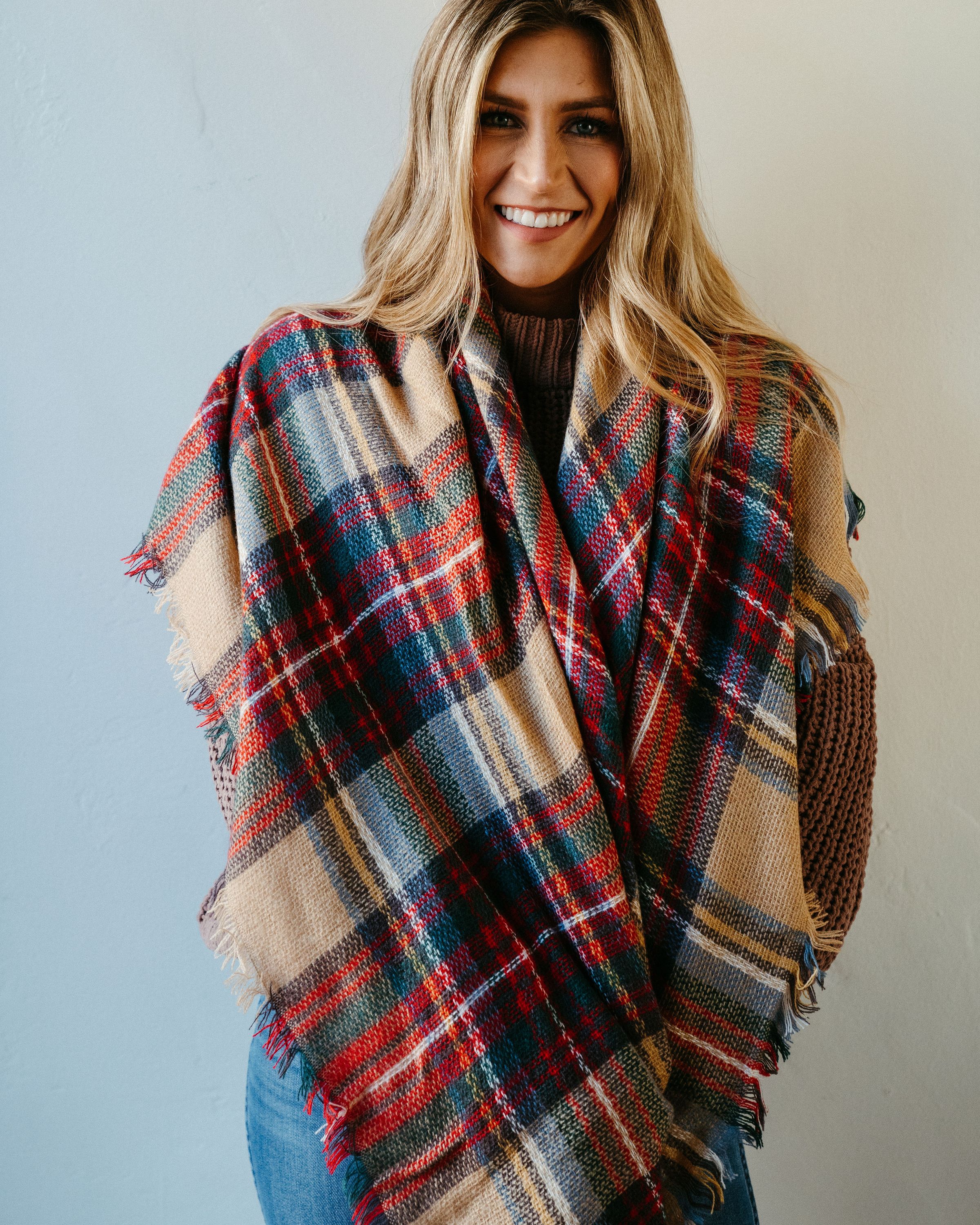 High Street Blanket Scarf in Khaki, showcasing its soft texture and generous size, perfect for versatile styling and cozy comfort.