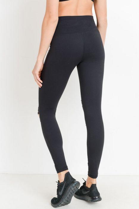 High Waist Laser Cut Ripped Knee Leggings featuring edgy knee distressing and a supportive high waistband.