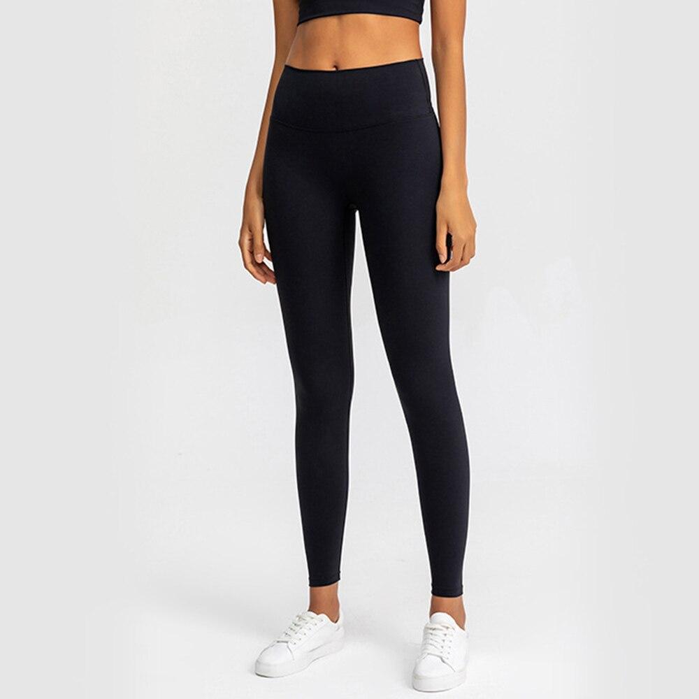 High Waist Naked Yoga Pants in black, featuring a seamless design and elastic waistband, perfect for women's fitness and yoga activities.