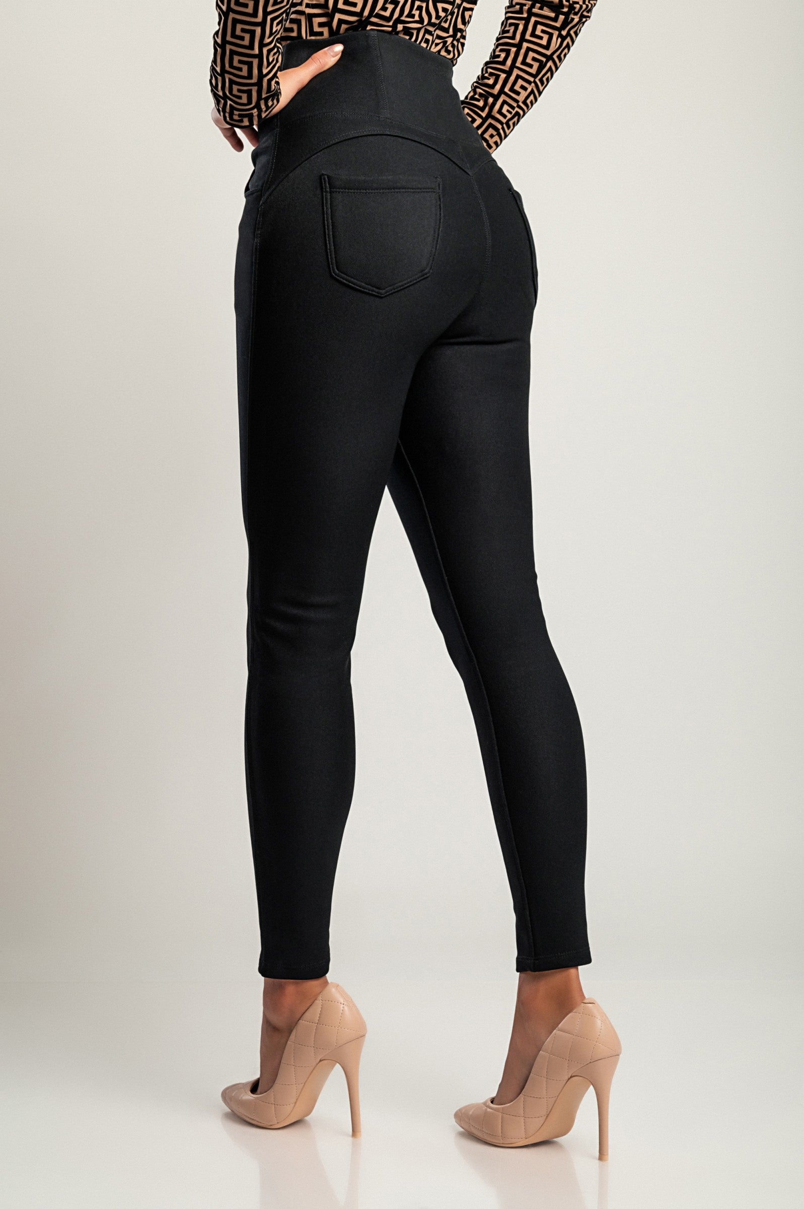 High Waist Padded Jeggings in Black with decorative buttons and pockets, showcasing a stylish and comfortable design.