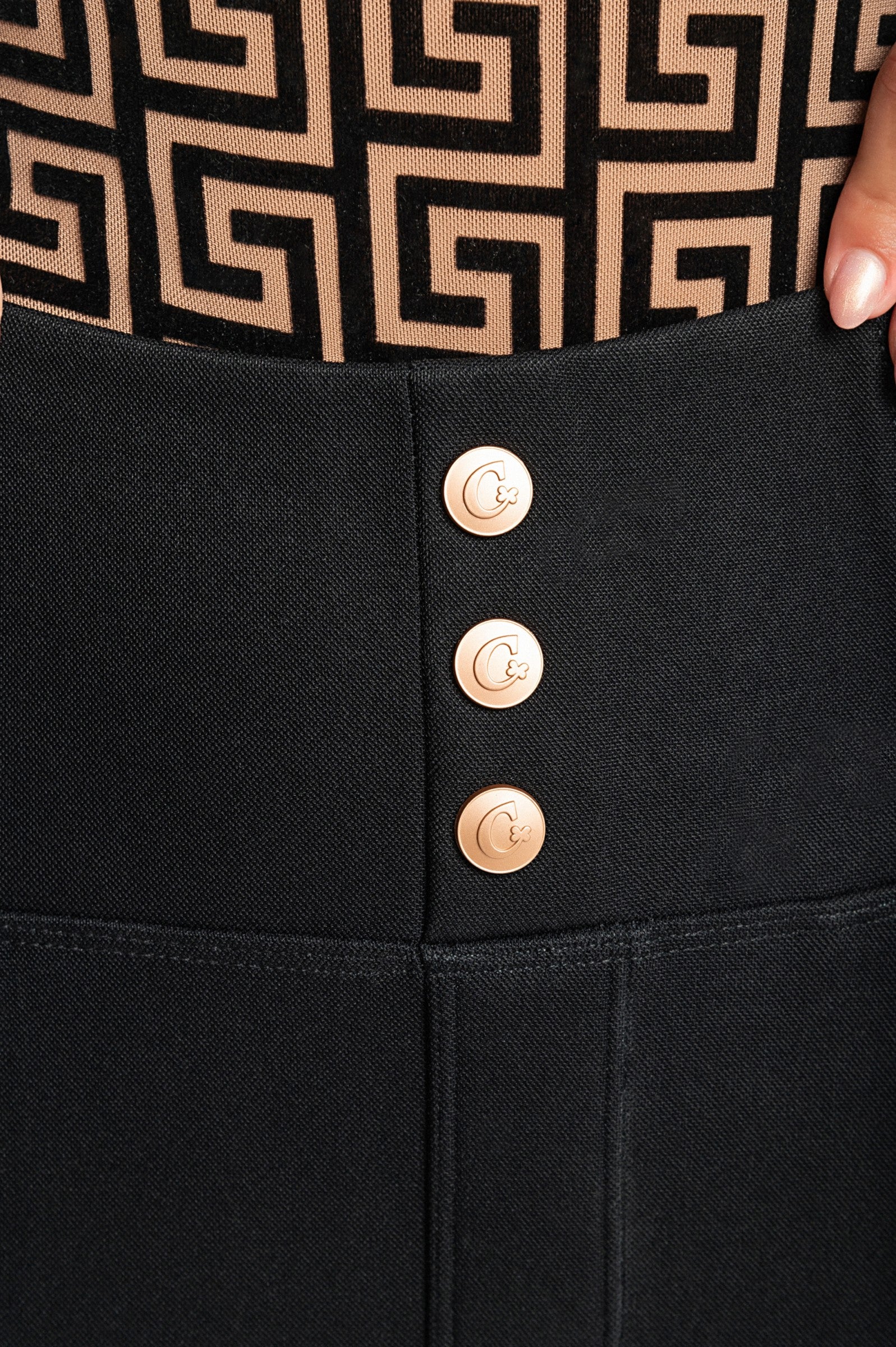 High Waist Padded Jeggings in Black with decorative buttons and pockets, showcasing a stylish and comfortable design.