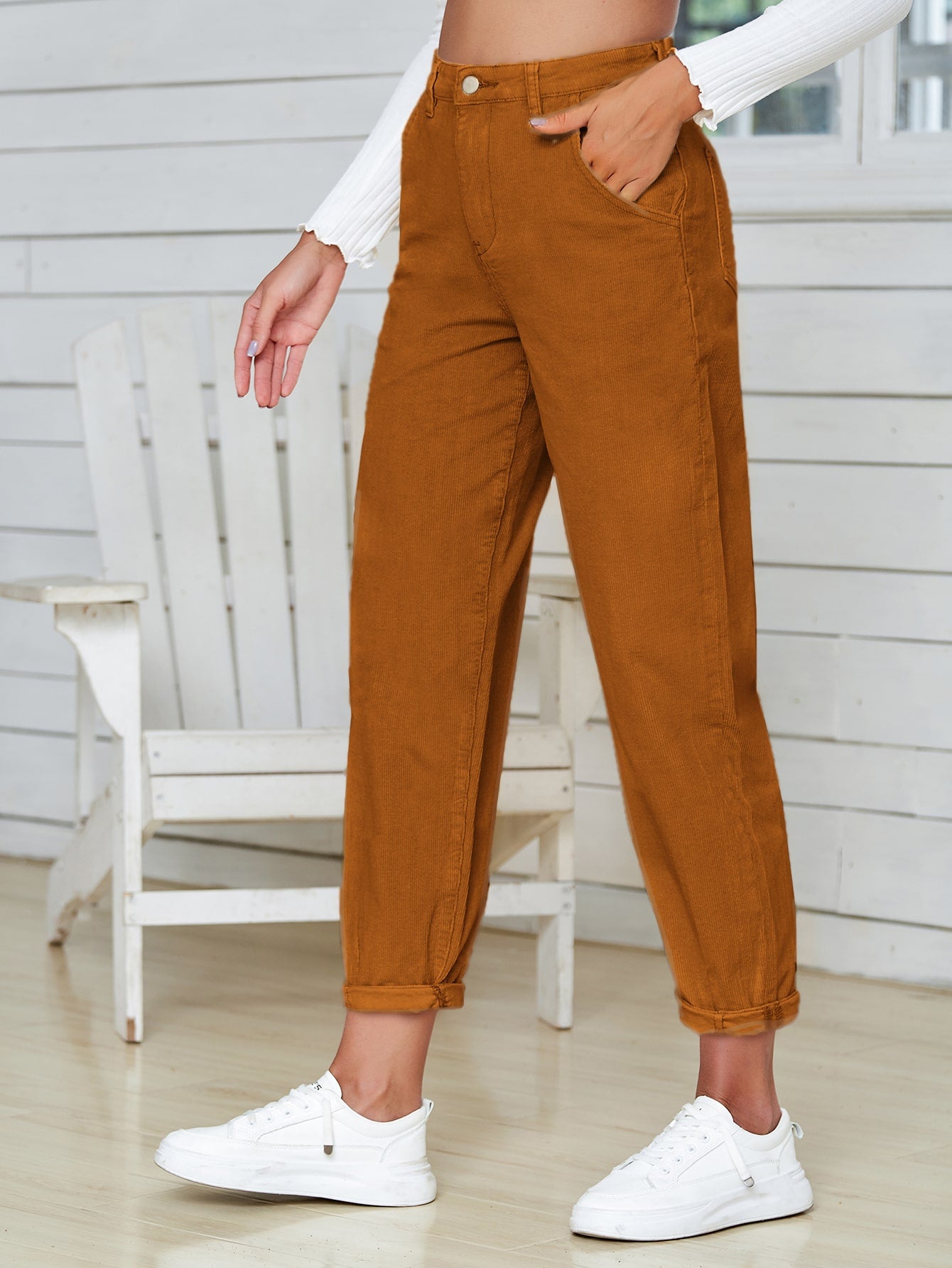 High Waist Pocketed Straight Leg Jeans displayed in a studio setting, showcasing their solid pattern and functional pockets.