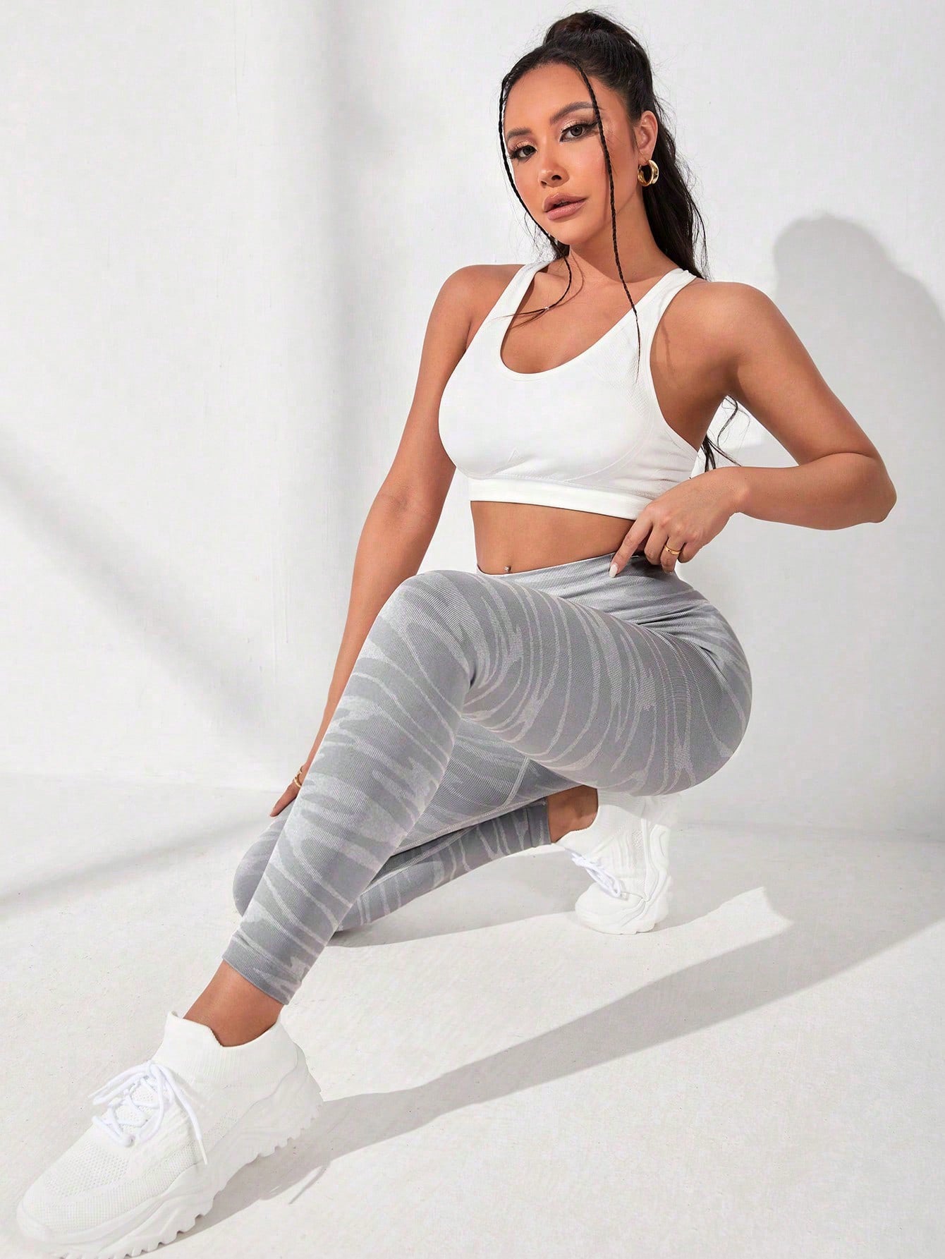 High Waist Slim Fit Long Active Pants in a sporty two-tone design, showcasing their stretchy material and flattering fit.