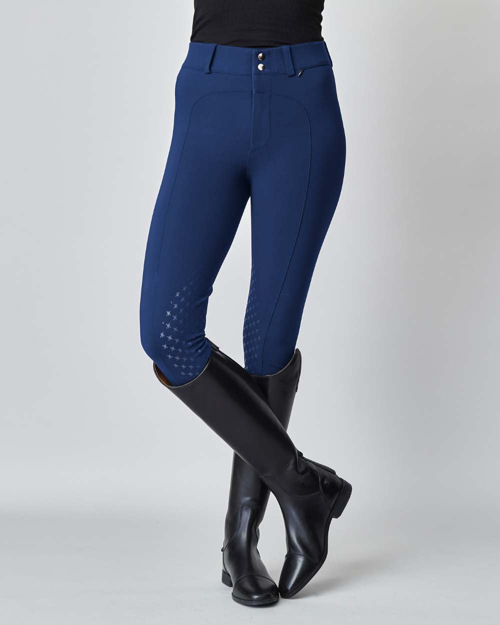 High-Rise Compression Breeches in Navy, featuring a high-rise fit, zipper, and belt loops, crafted from lightweight Italian jersey fabric.