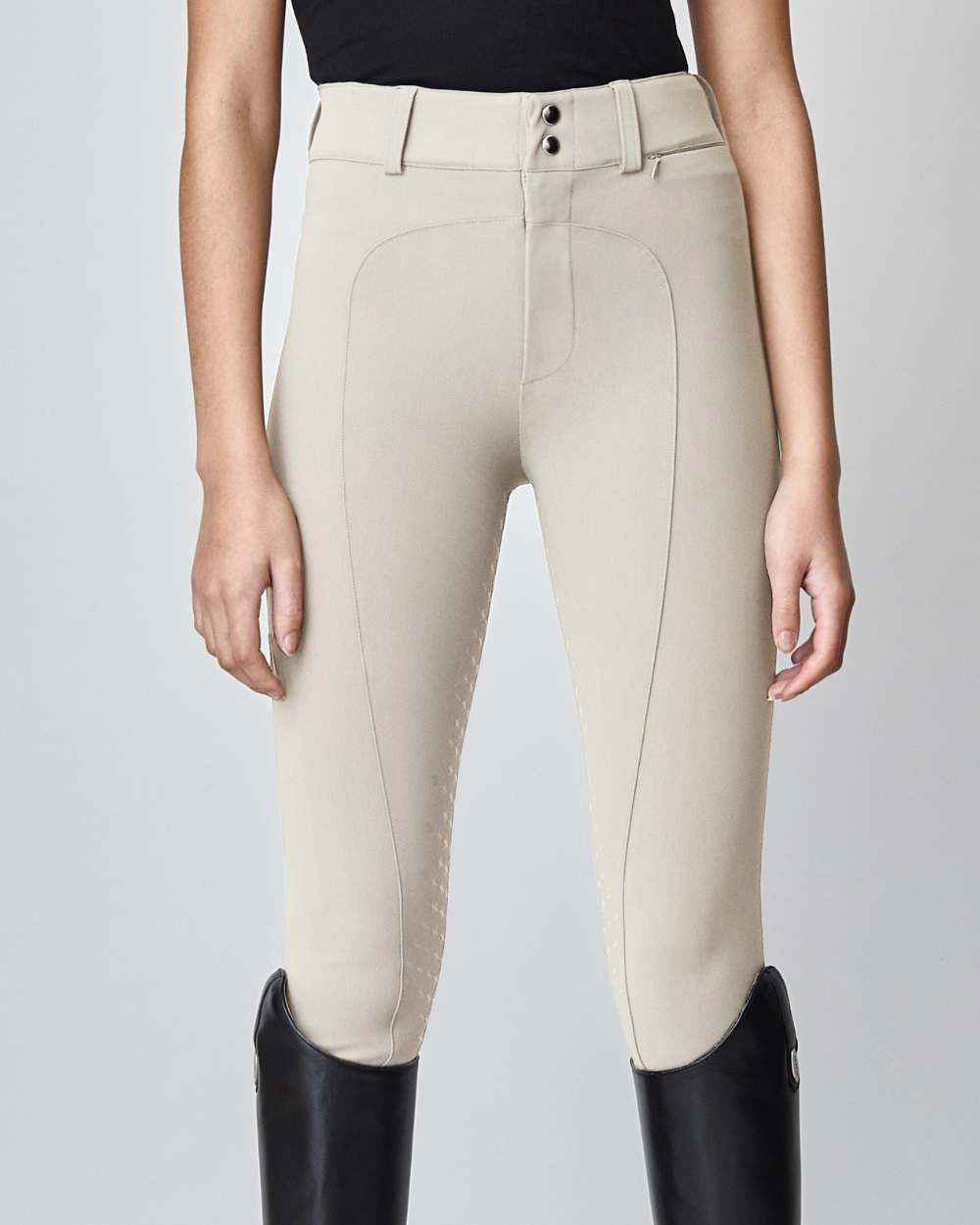 High-Rise Compression Breeches in Tan, featuring a high waist, zipper, and belt loops, made from lightweight Italian jersey fabric.