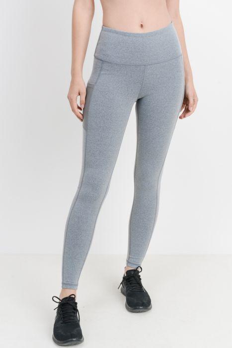 Highwaist Essential Leggings featuring mesh pockets, made from Supplex and Lycra blend, ideal for workouts and casual wear.