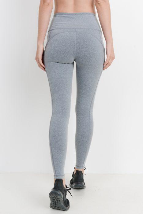 Highwaist Essential Leggings featuring mesh pockets, made from Supplex and Lycra blend, ideal for workouts and casual wear.