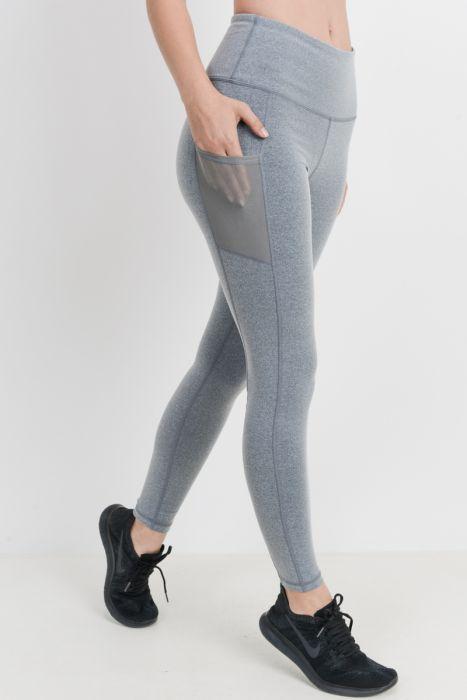 Highwaist Essential Leggings featuring mesh pockets, made from Supplex and Lycra blend, ideal for workouts and casual wear.