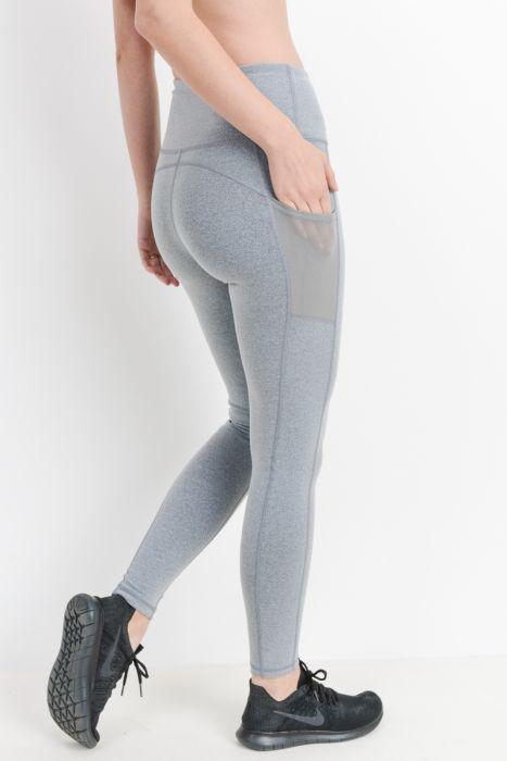 Highwaist Essential Leggings featuring mesh pockets, made from Supplex and Lycra blend, ideal for workouts and casual wear.