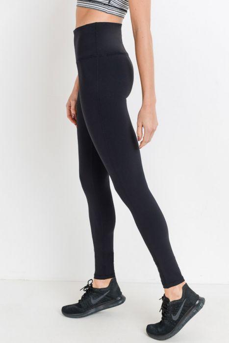 Highwaist Essential Solid Leggings in various colors, showcasing high waistband and hidden phone pouch.