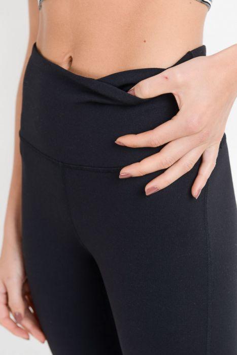 Highwaist Essential Solid Leggings in various colors, showcasing high waistband and hidden phone pouch.