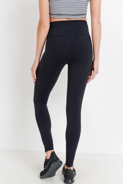 Highwaist Essential Solid Leggings in various colors, showcasing high waistband and hidden phone pouch.