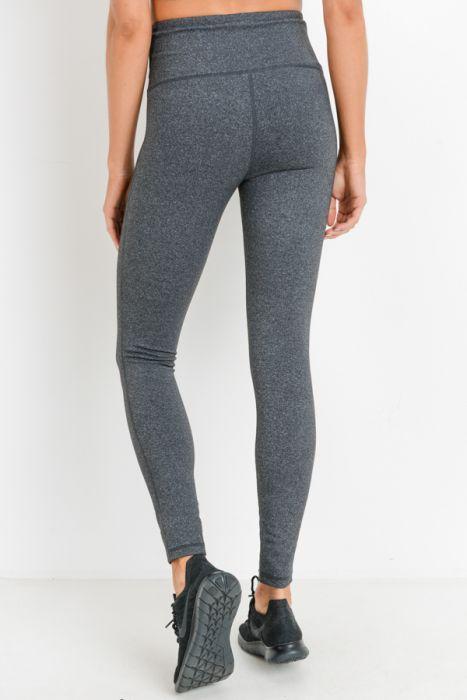 Highwaist Essential Solid Leggings in various colors, showcasing high waistband and hidden phone pouch.